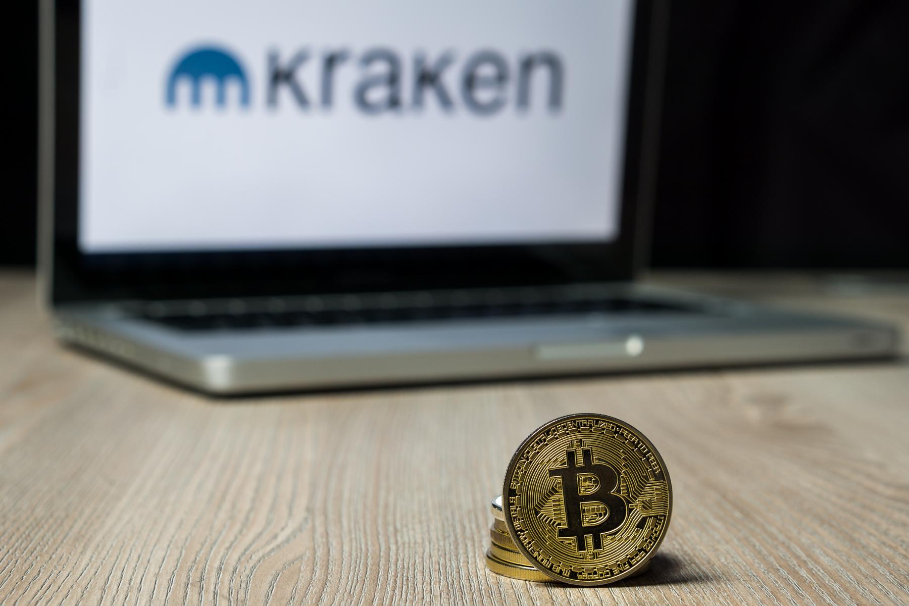 Bitcoin-BTC-on-tablet-background-with-Kraken-exchange-logo